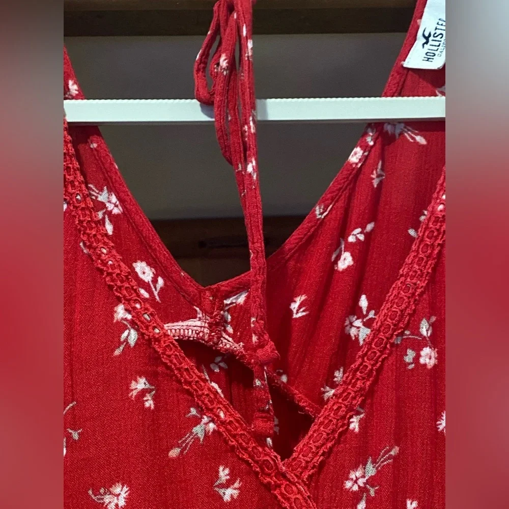 4/$25*Hollister, featuring a V-neck, peplum hem, and long flared sleeves. L - Picture 5 of 7